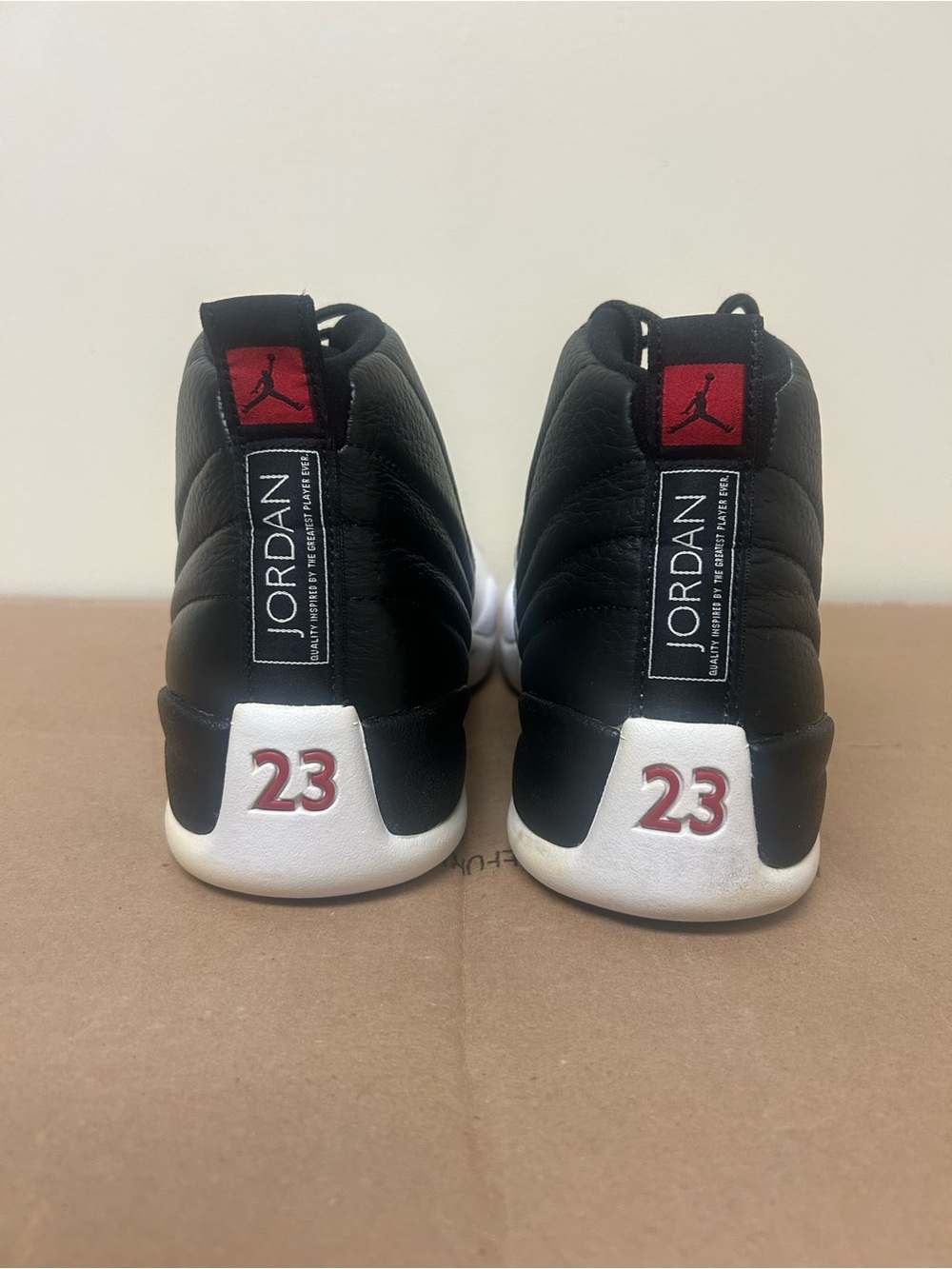 Air Jordan Retro 12 Playoffs black and white sneakers